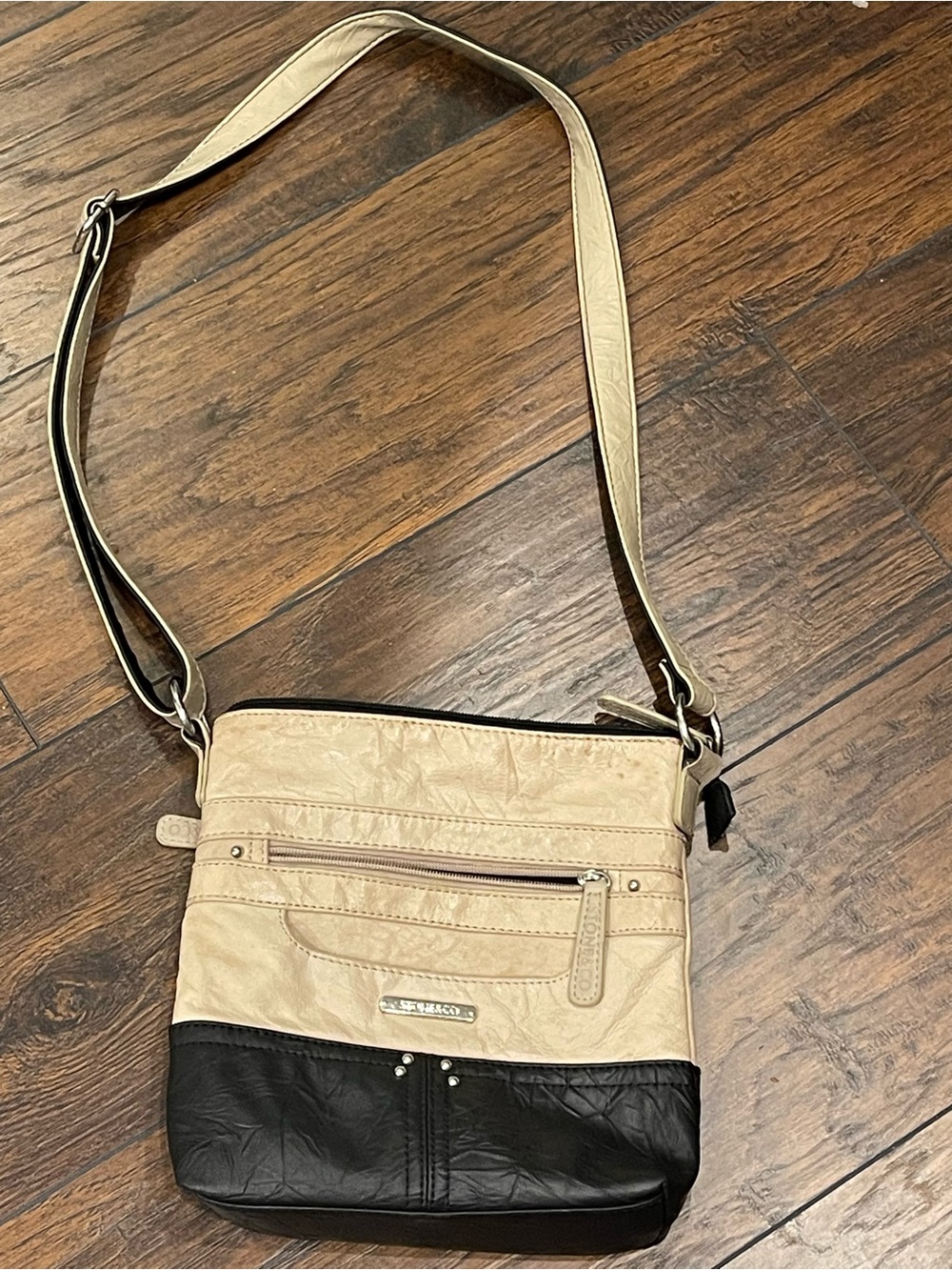 Two-Tone Beige and Black Crossbody Bag with Front Zip Pocket